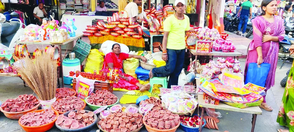 Shoppers buying Karwa Chauth thali and puja material in Indore